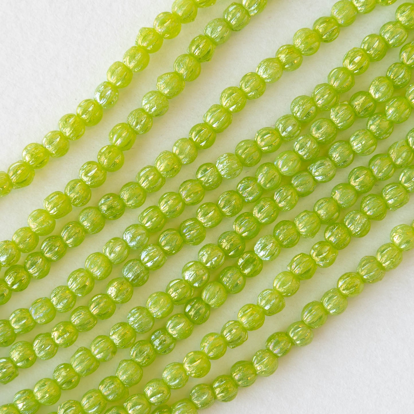 3mm Melon Beads -  Milky Iris Peridot Luster - 100 Beads