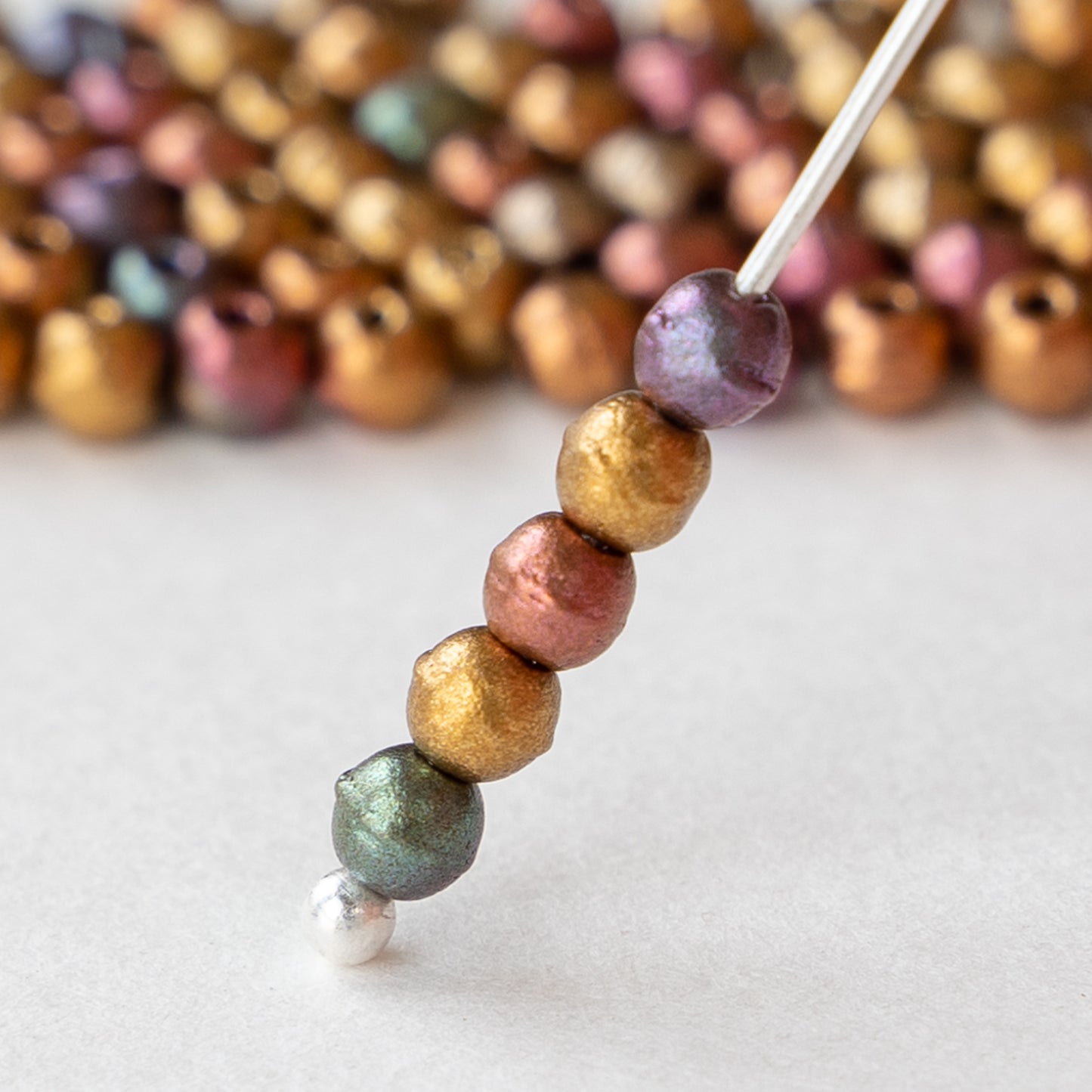 Load image into Gallery viewer, 3mm Round Glass Beads - Gold Iris Matte - 120 Beads
