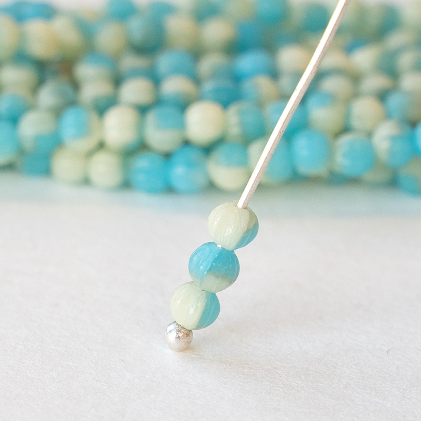 Load image into Gallery viewer, 3mm Melon Bead - Ivory and Aqua  - 100 beads

