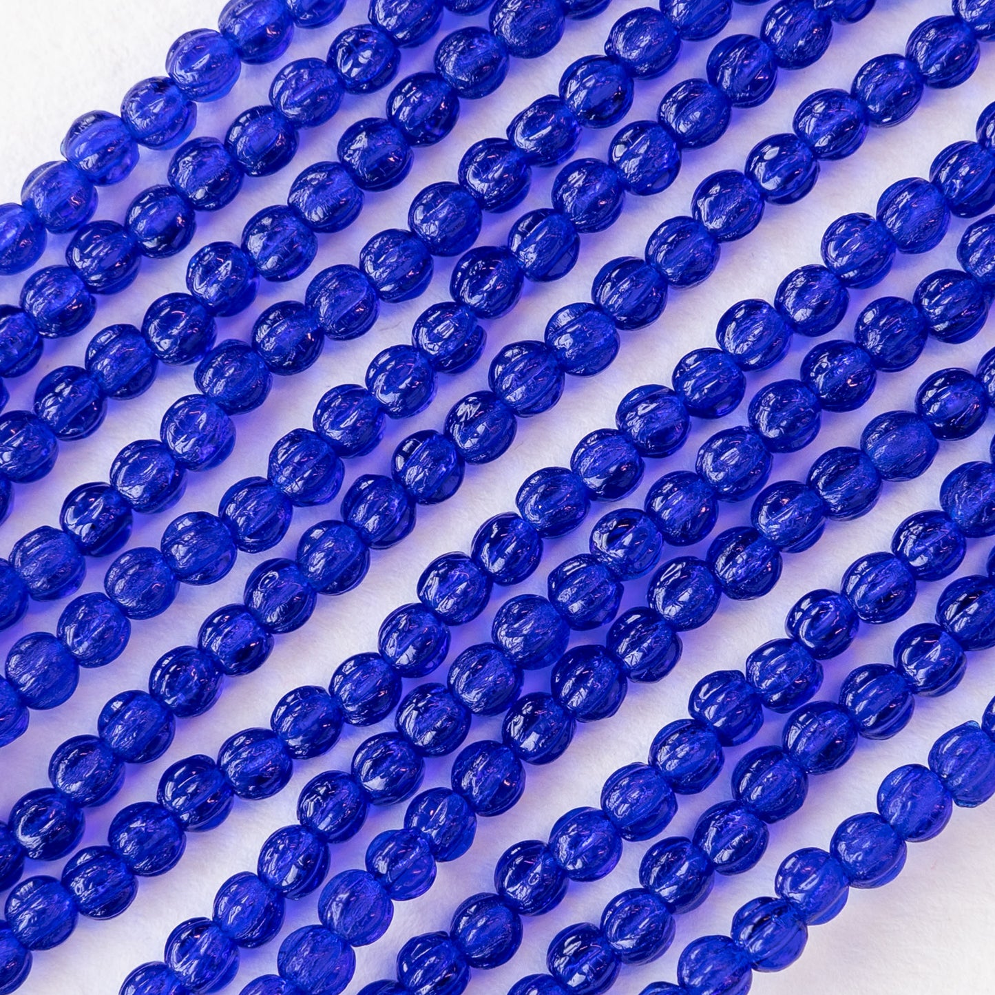 Load image into Gallery viewer, 3mm Glass Melon Beads - Cobalt Blue - 100 Beads
