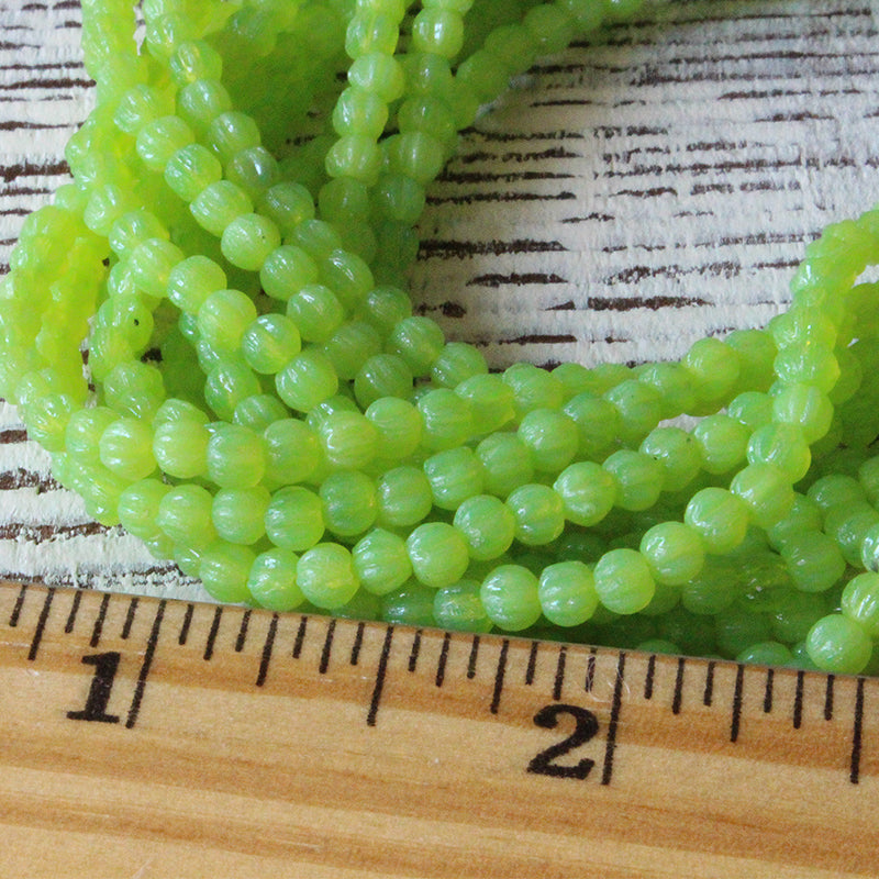 Load image into Gallery viewer, 3mm Glass Melon Beads - Opaline Lime - 100 Beads
