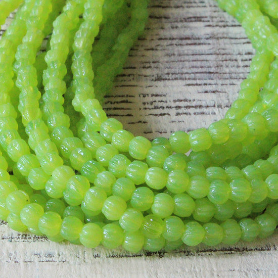 Load image into Gallery viewer, 3mm Glass Melon Beads - Opaline Lime - 100 Beads
