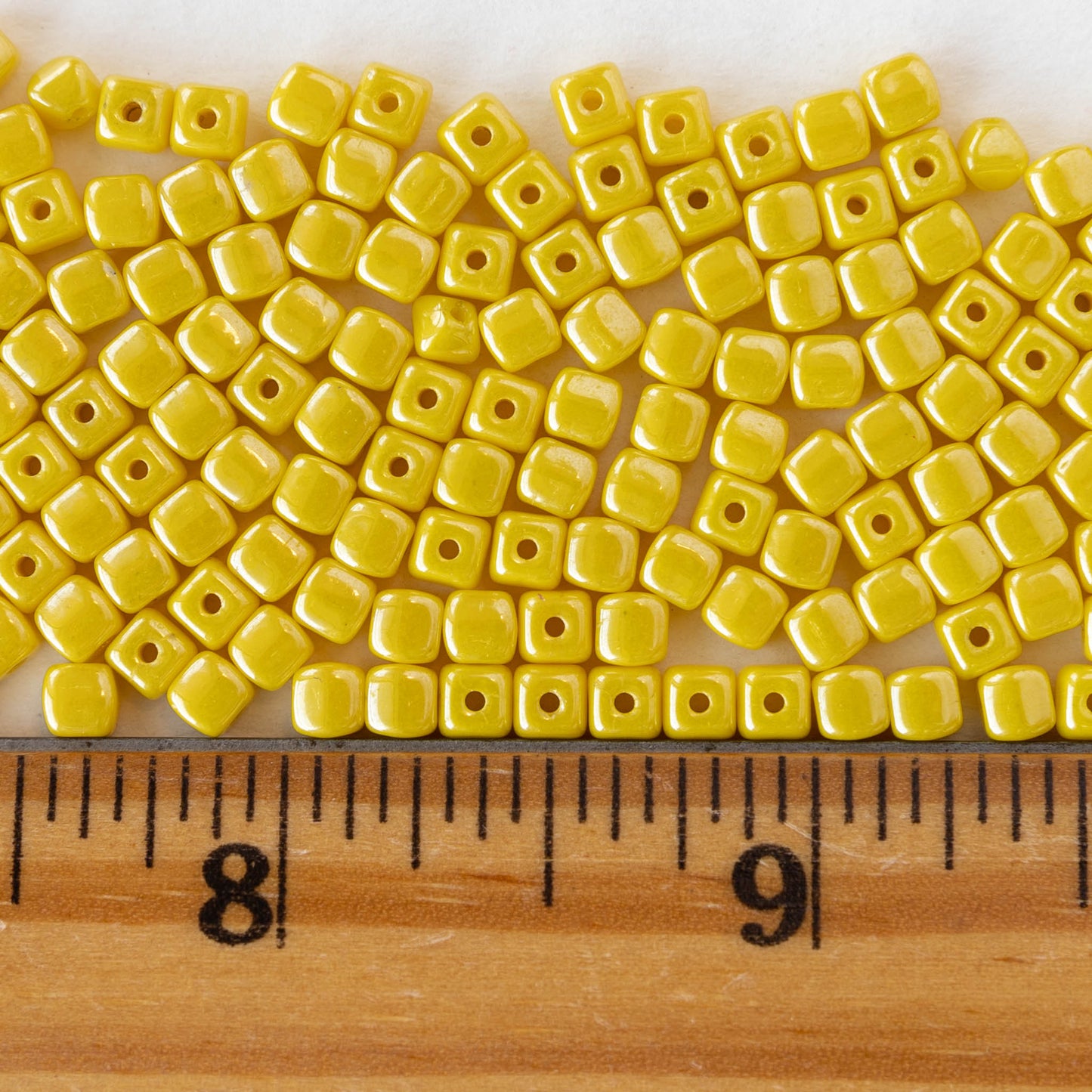 Load image into Gallery viewer, 4mm Glass Cube Beads - Opaque Yellow - 100 beads
