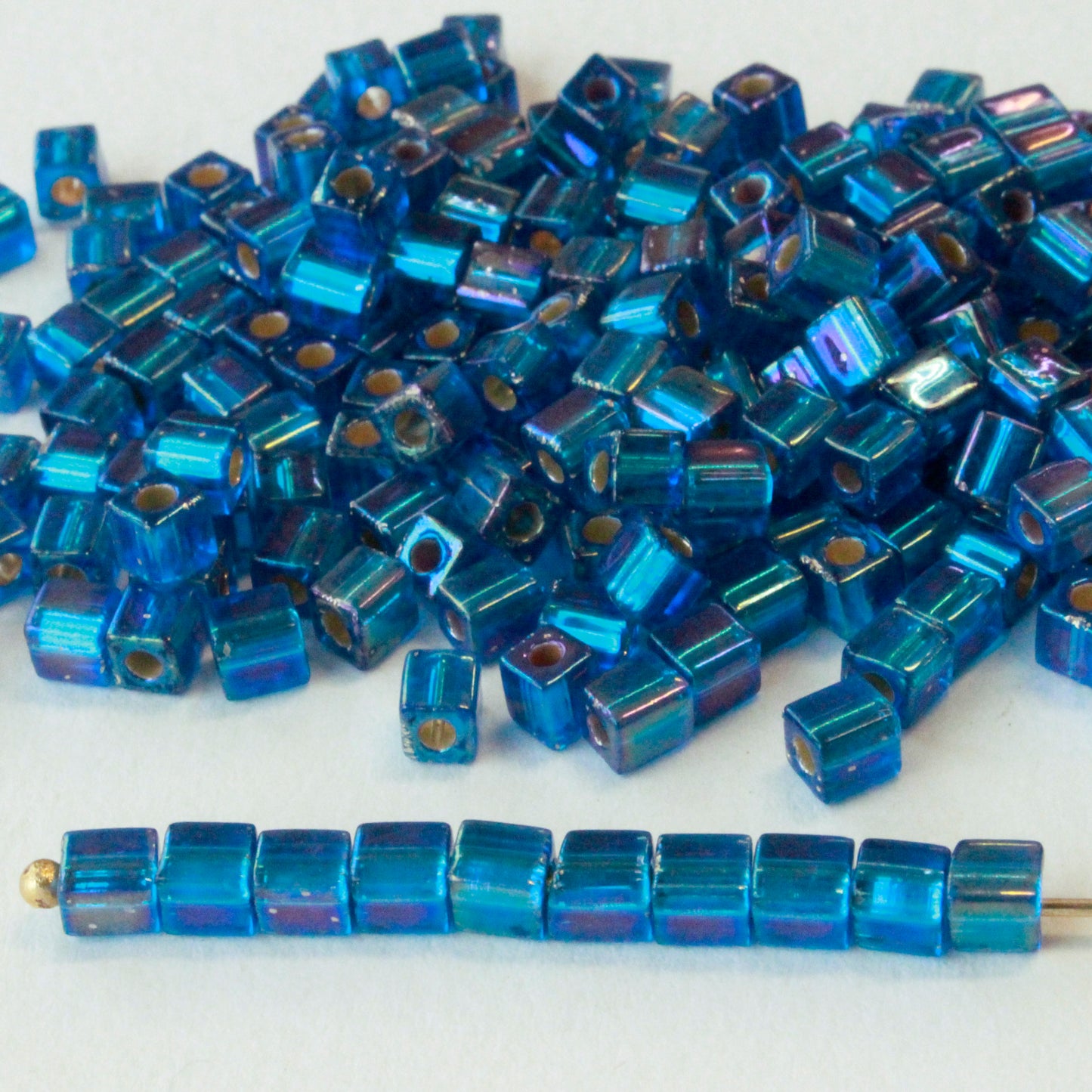 Load image into Gallery viewer, 4mm Miyuki Cube Beads  - Silver Lined Capri Blue - 20 or 60 grams
