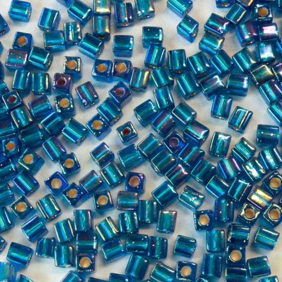 Load image into Gallery viewer, 4mm Miyuki Cube Beads  - Silver Lined Capri Blue - 20 or 60 grams
