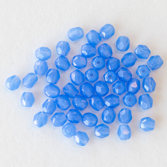 Load image into Gallery viewer, 4mm Round Firepolished Beads - Periwinkle Blue Opaline - 50 beads

