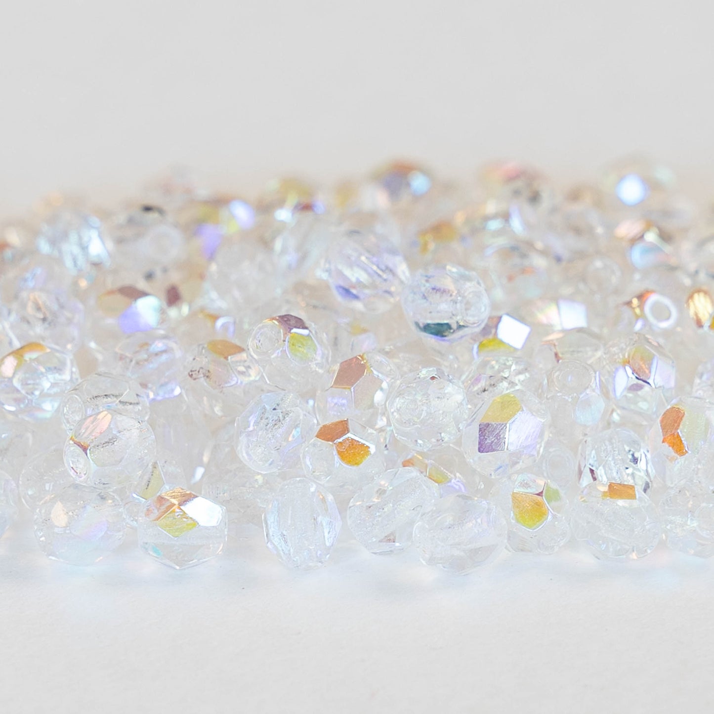 Load image into Gallery viewer, 4mm Round Firepolished Beads - Crystal AB - 100 Beads
