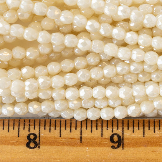 Load image into Gallery viewer, 4mm Round Firepolished Beads - Ivory Luster- 50 Beads
