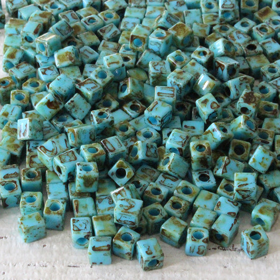 4mm Miyuki Cube Beads - Turquoise Picasso - 20 or 60 grams