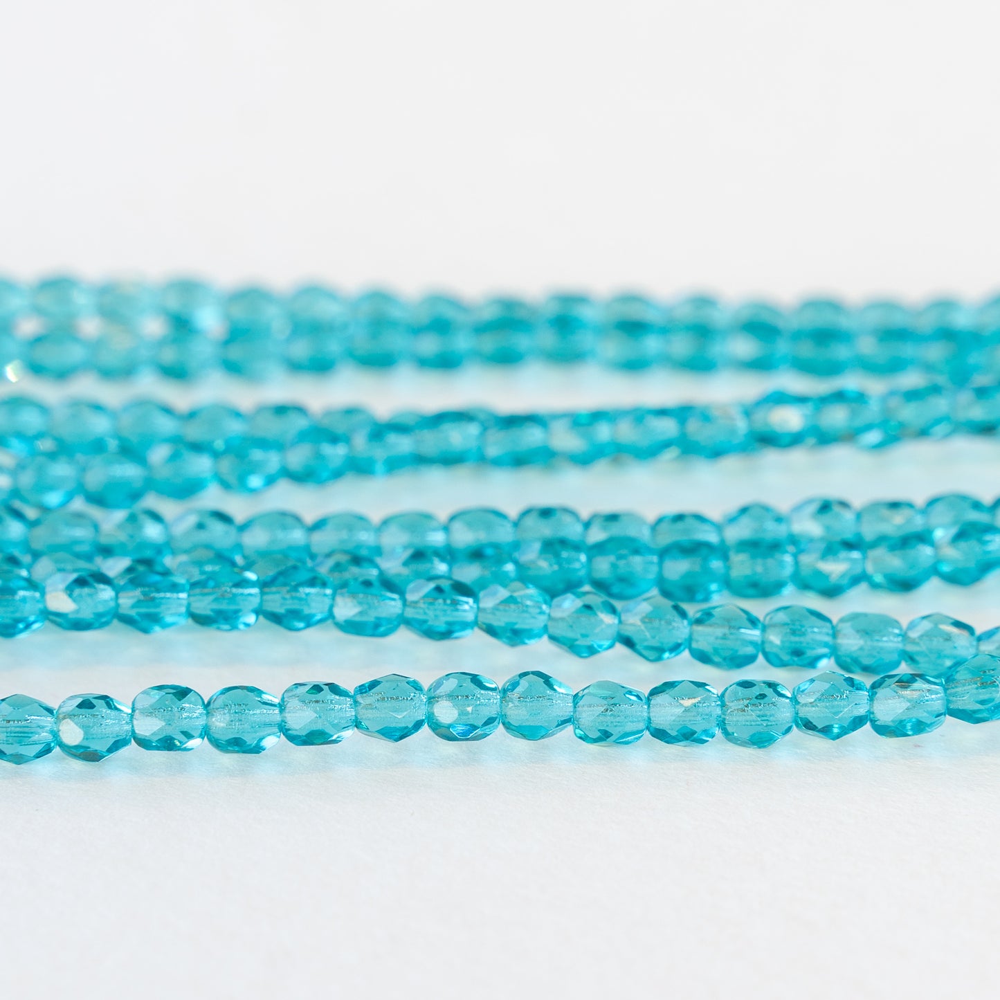 4mm Round Firepolished Beads - Aquamarine - 58 Beads