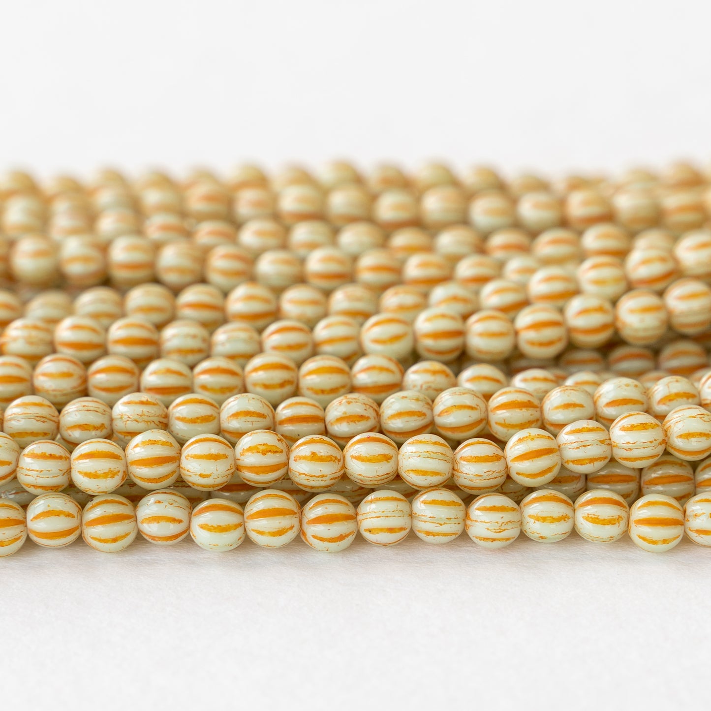 4mm Melon Beads - Ivory with Orange Wash - 58 Beads