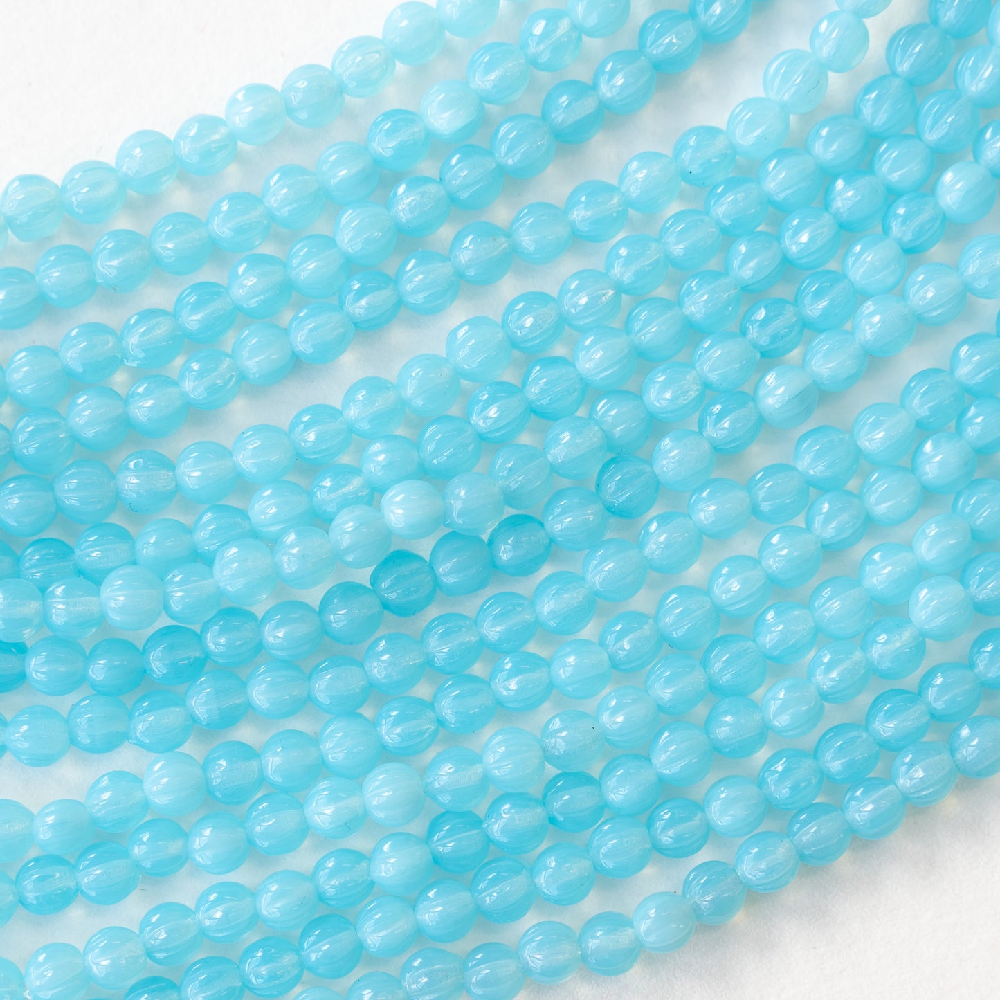 4mm Glass Melon Beads - Baby Blue Opaline - 58 beads