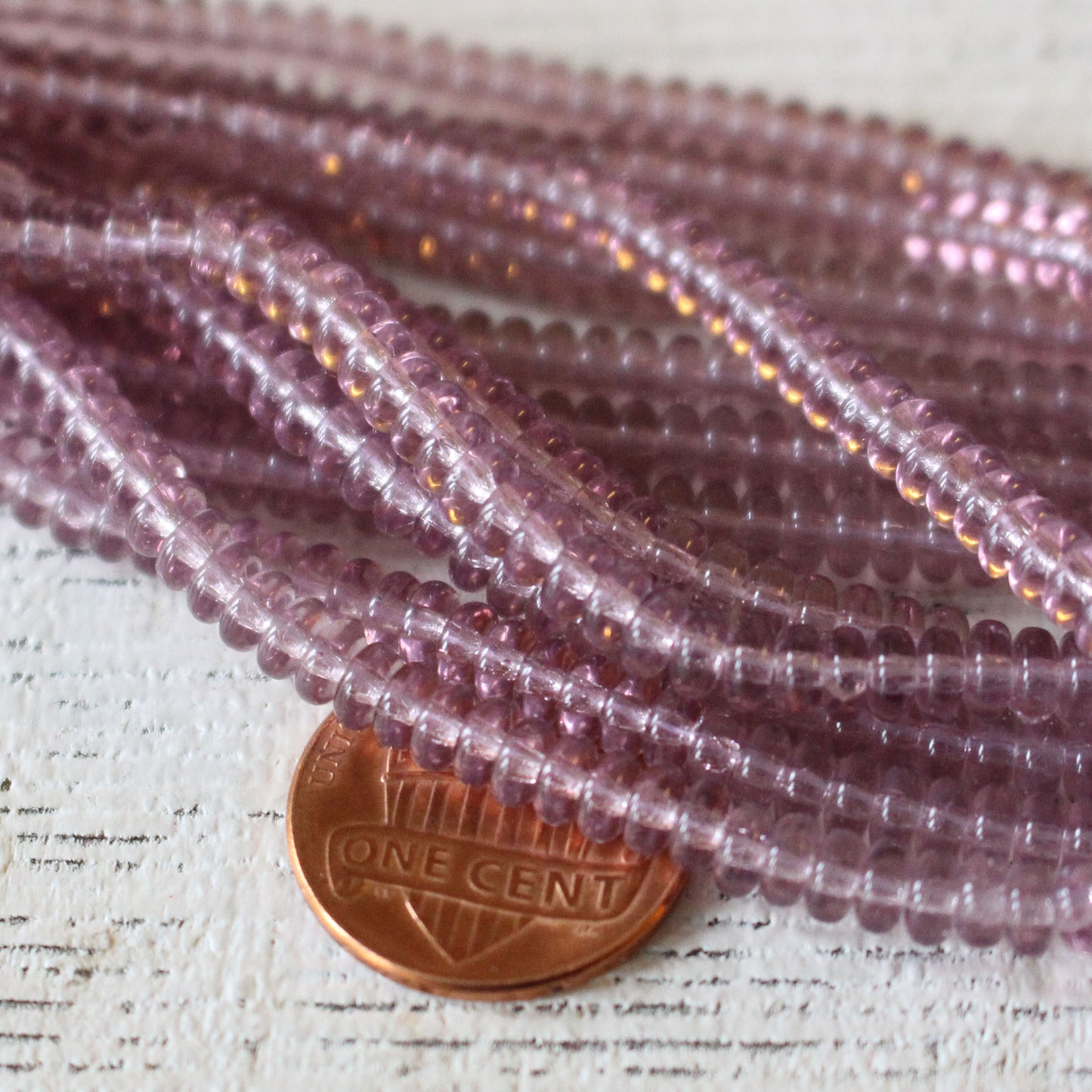 Load image into Gallery viewer, 4mm Rondelle Beads - Amethyst - 100 beads
