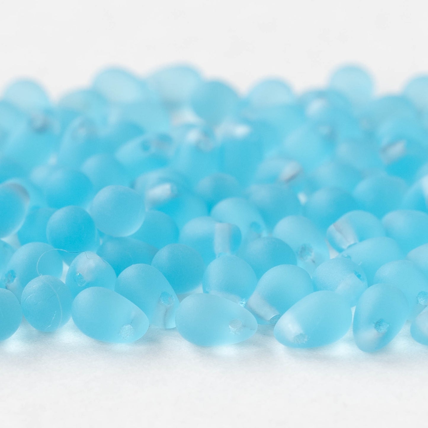 Load image into Gallery viewer, 4x6mm Glass Teardrop Beads - Light Aqua Blue Matte - 100 Beads
