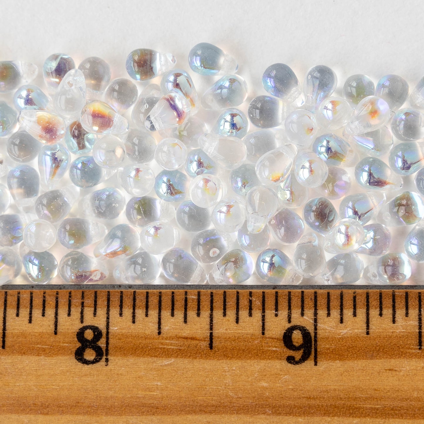Load image into Gallery viewer, 4x6mm Glass Teardrop Beads - Crystal AB - 100 Beads
