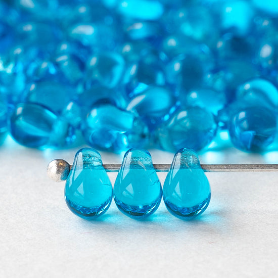 4x6mm Glass Teardrop Beads - Capri Blue - 100 Beads