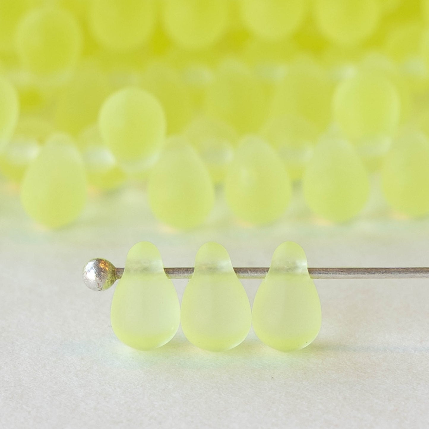 Load image into Gallery viewer, 4x6mm Frosted Glass Teardrops - Jonquil Yellow -  100 Beads
