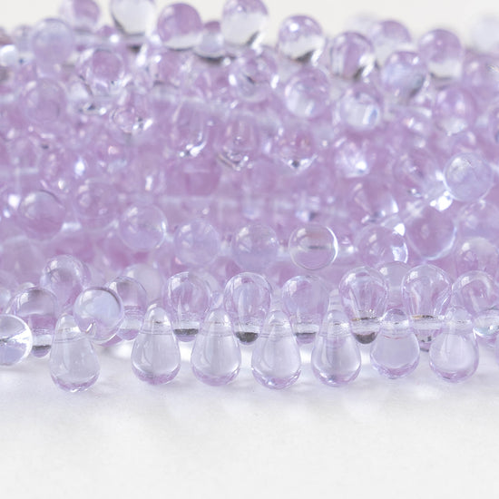 Load image into Gallery viewer, 4x6mm Glass Teardrop Beads - Light Lilac Purple - 100 Beads
