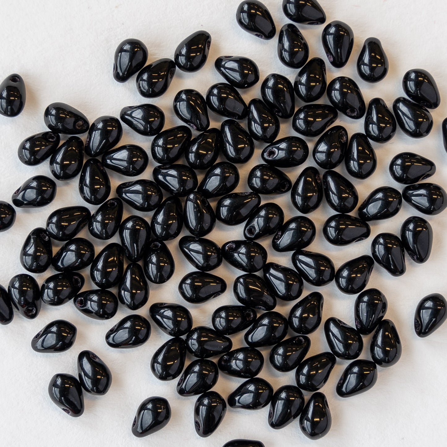 Load image into Gallery viewer, 4x6mm Glass Teardrop Beads - Black - 100 Beads
