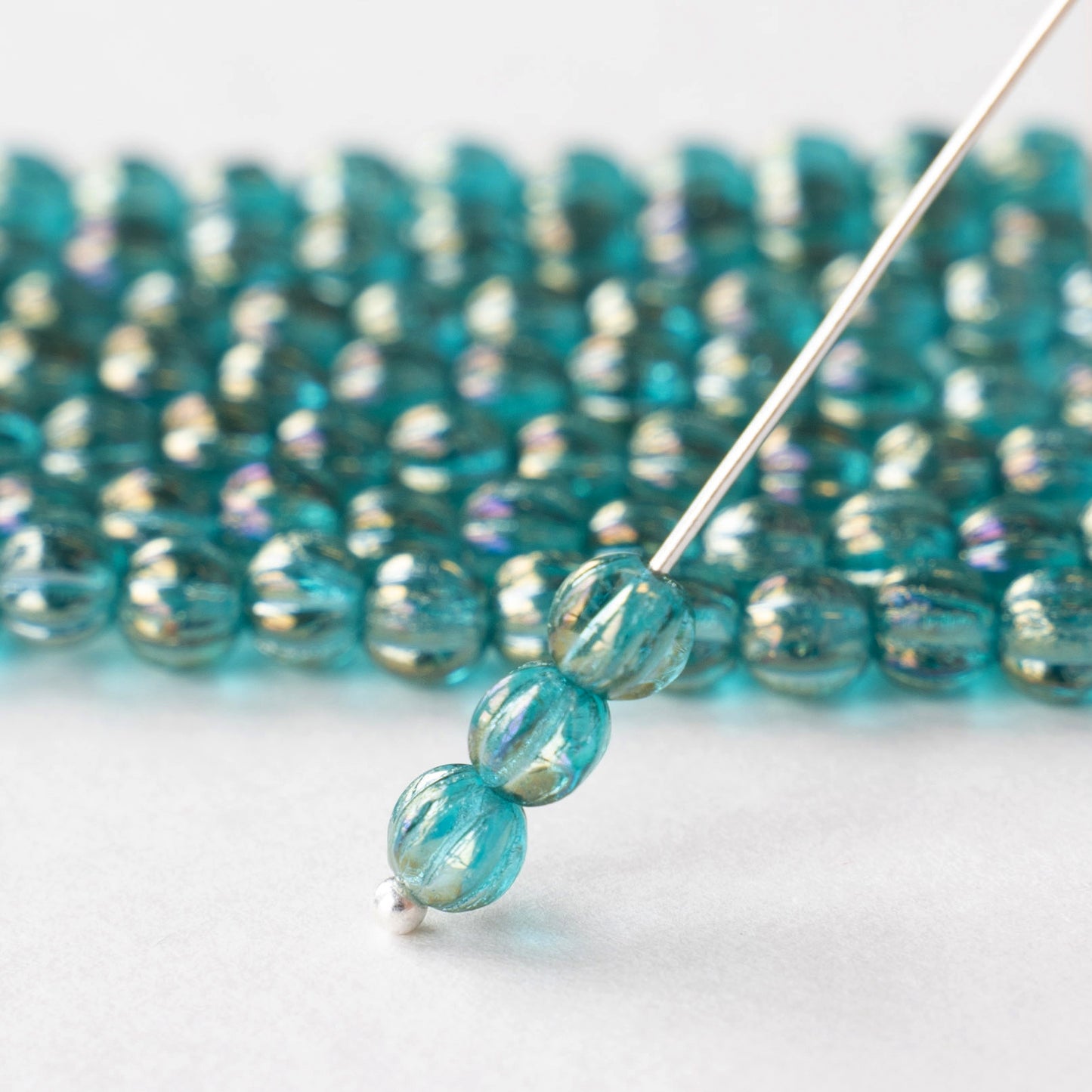 Load image into Gallery viewer, 5mm Melon Bead - Aquamarine Luster - 100 Beads
