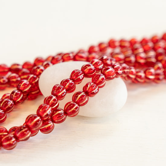 Load image into Gallery viewer, 5mm Melon Beads - Red with Gold Wash - 50 Beads
