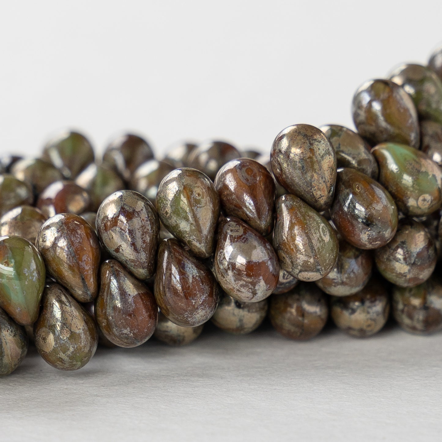 Load image into Gallery viewer, 5x7mm Glass Teardrop Beads - Brown Green and Pyrite - 48 Beads

