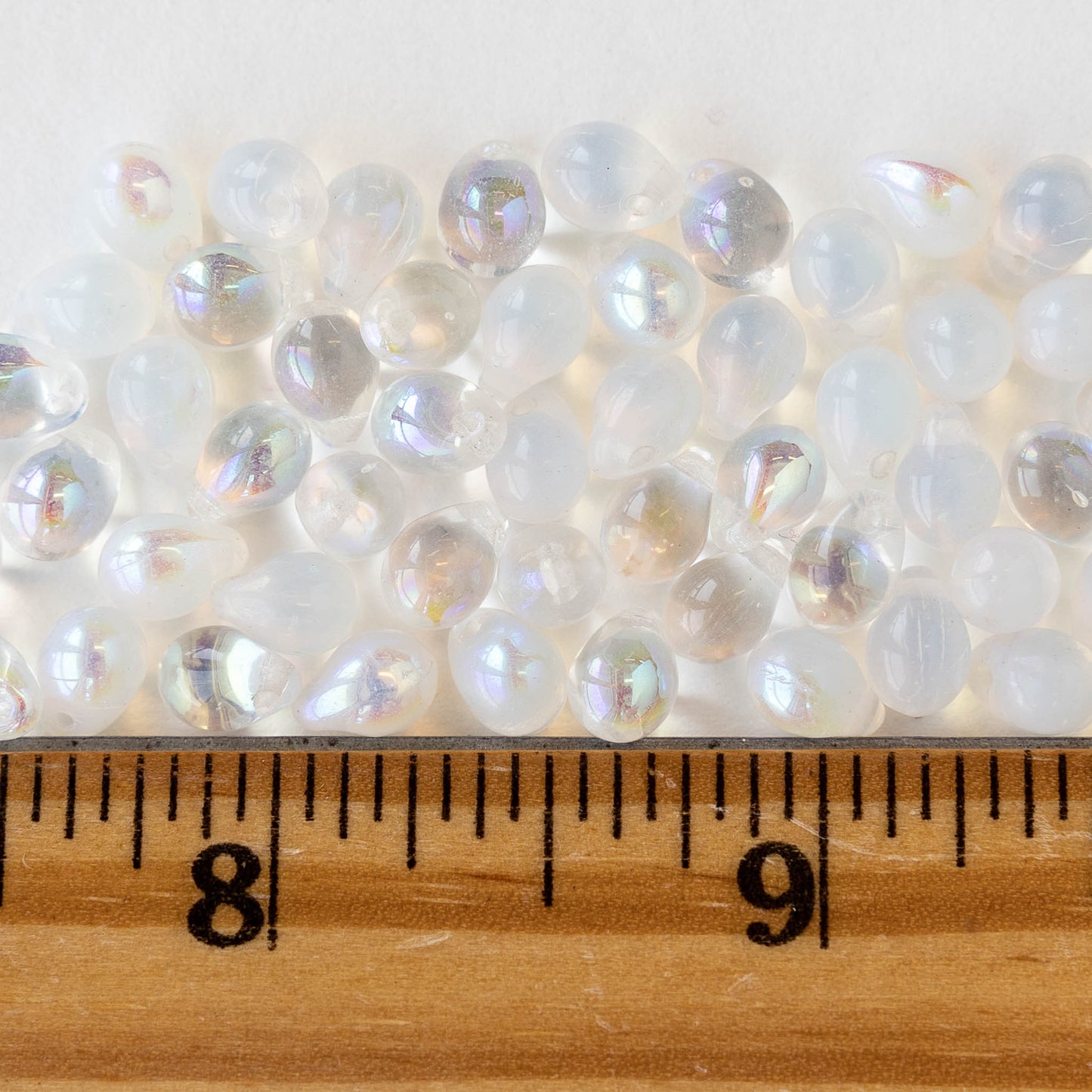 Load image into Gallery viewer, 5x7mm Glass Teardrop Beads - Pearly Opal AB - 50 Beads
