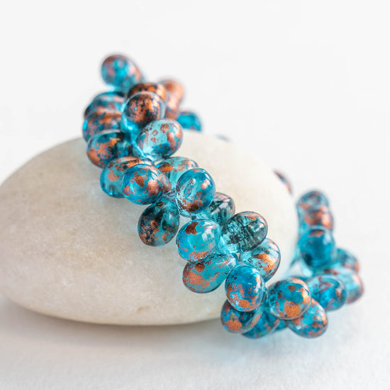 Load image into Gallery viewer, 5x7mm Teardrop Beads - Capri Blue with Copper - 50 Beads
