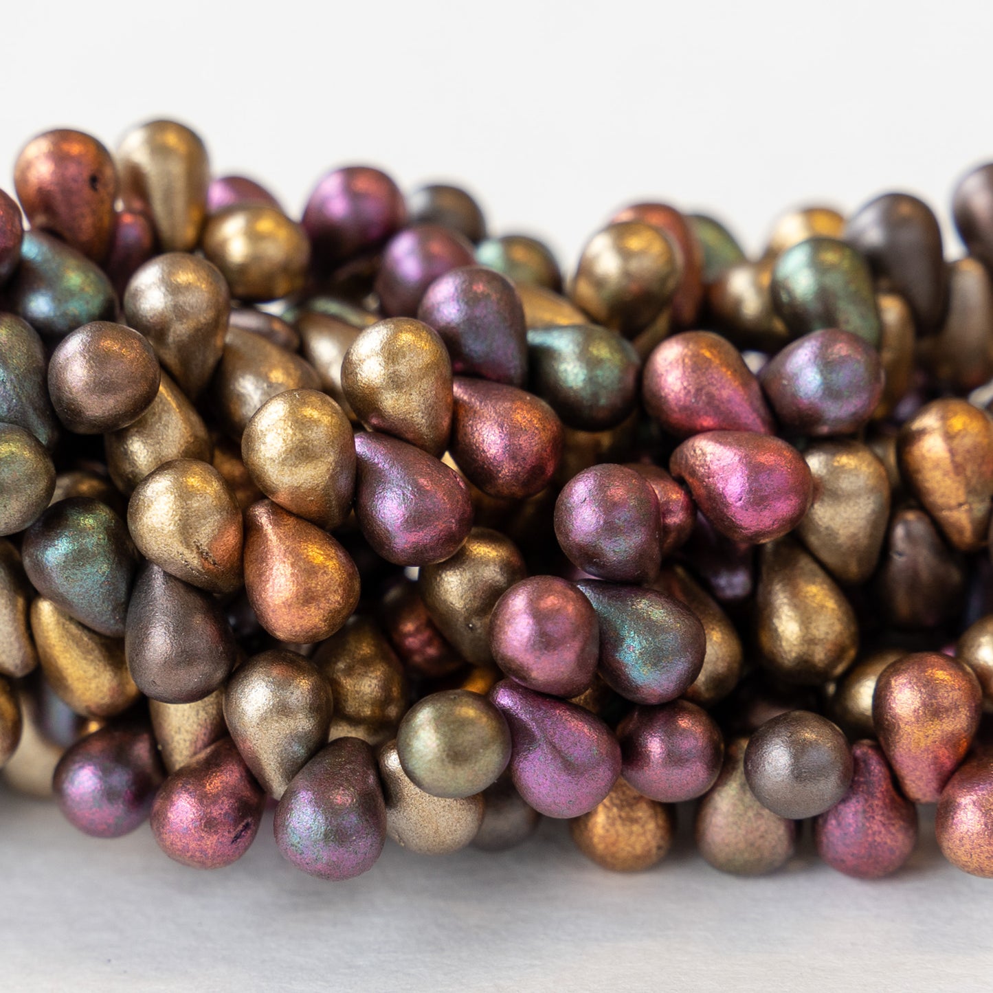 5x7mm Glass Teardrop Beads - Metallic Matte Gold Iris - 47 Beads