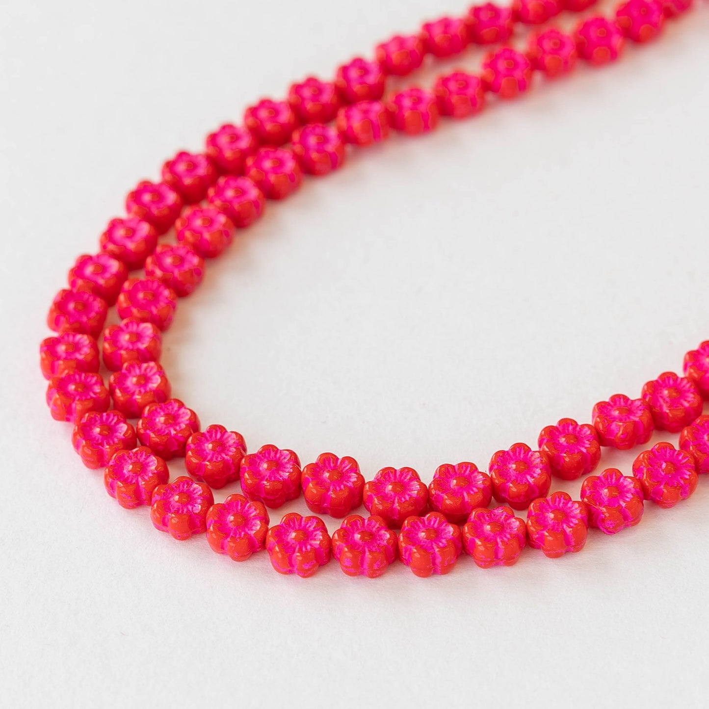 Load image into Gallery viewer, 6mm Glass Flower Beads - Red with Pink Wash - 30 beads
