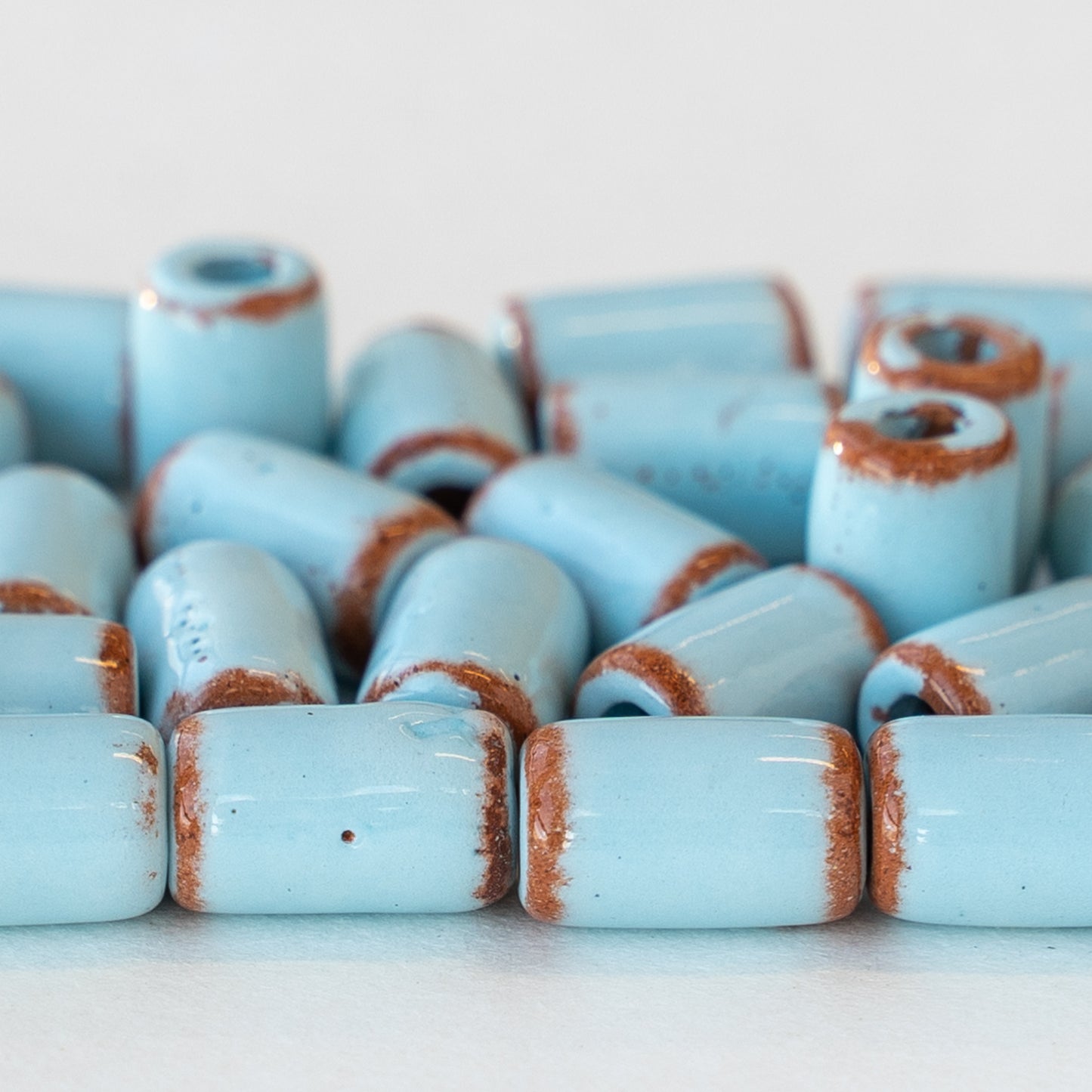 6x10mm Shiny Glazed Ceramic Tube Beads - Baby Blue