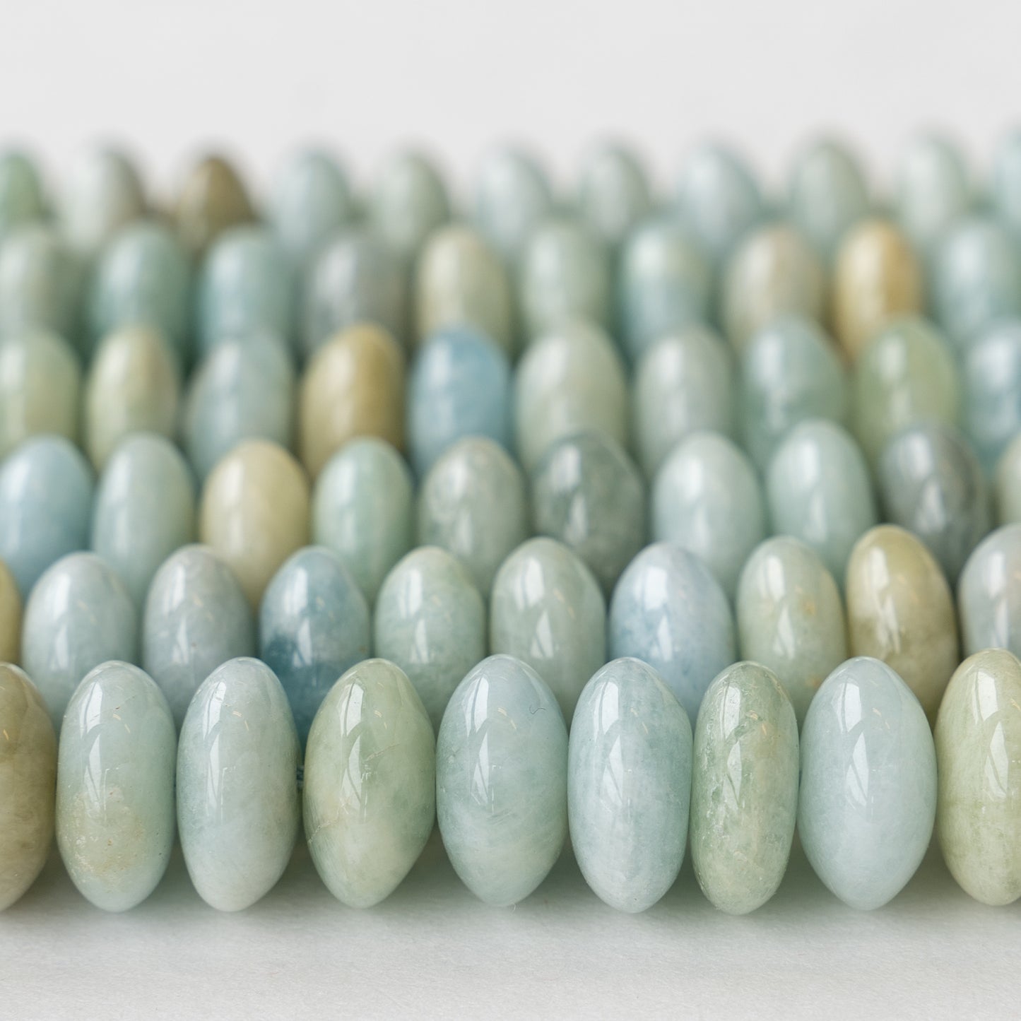 6x12mm Round Aquamarine Gemstone Beads - 16 Inches