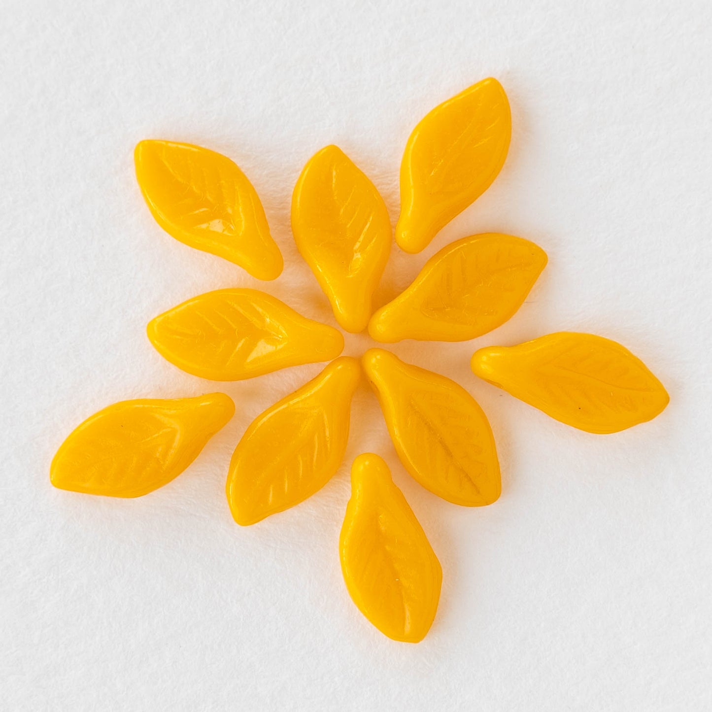 Load image into Gallery viewer, 6x12mm Glass Leaf Beads - Opaque Sunflower Yellow - 30 beads
