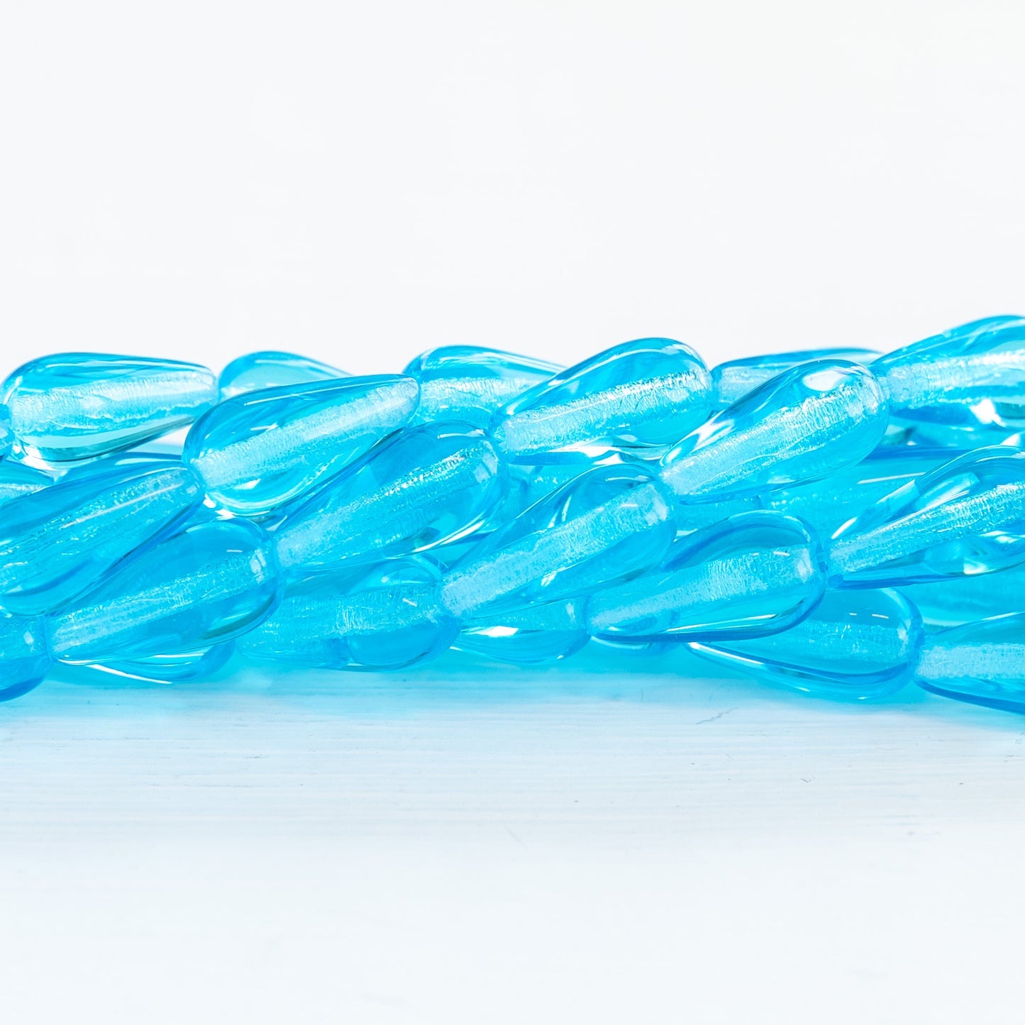 Load image into Gallery viewer, 12mm Long Drill Glass Teardrop Beads - Aqua - 20 Beads
