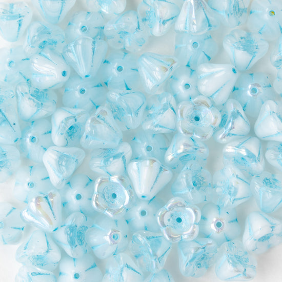 Load image into Gallery viewer, 6x8mm Trumpet Flower Beads - Creamy White with Blue Wash - 30 beads
