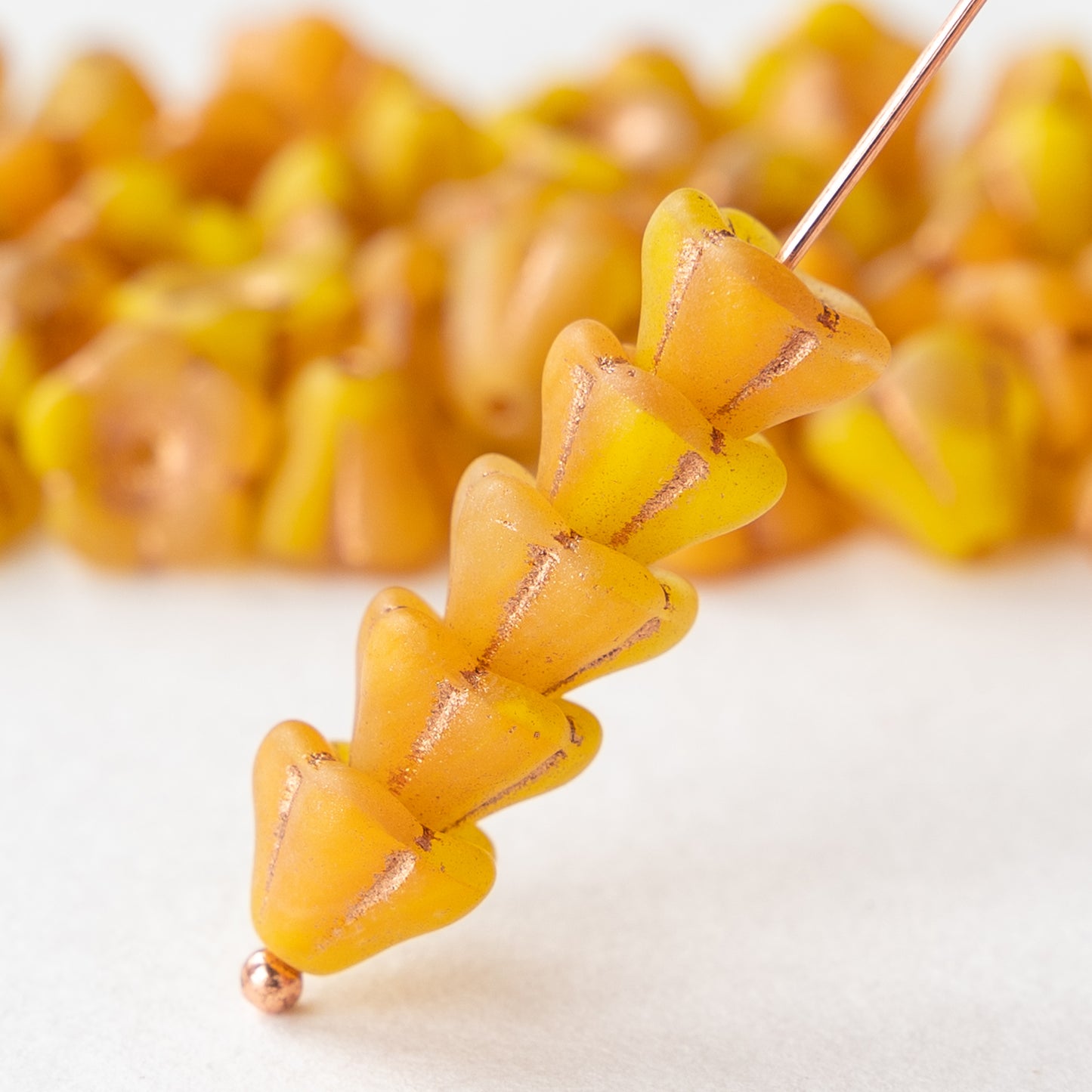 Load image into Gallery viewer, 6x8mm Trumpet Flower Beads - Yellow Orange Mix with Pink Wash - 30 beads
