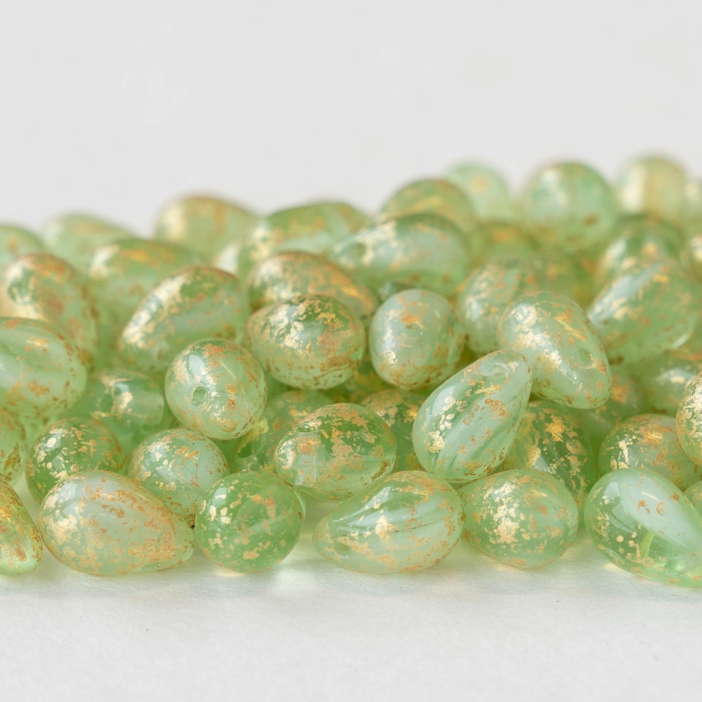 6x9mm Glass Teardrop Beads - Light Green with Gold Dust - 50 Beads