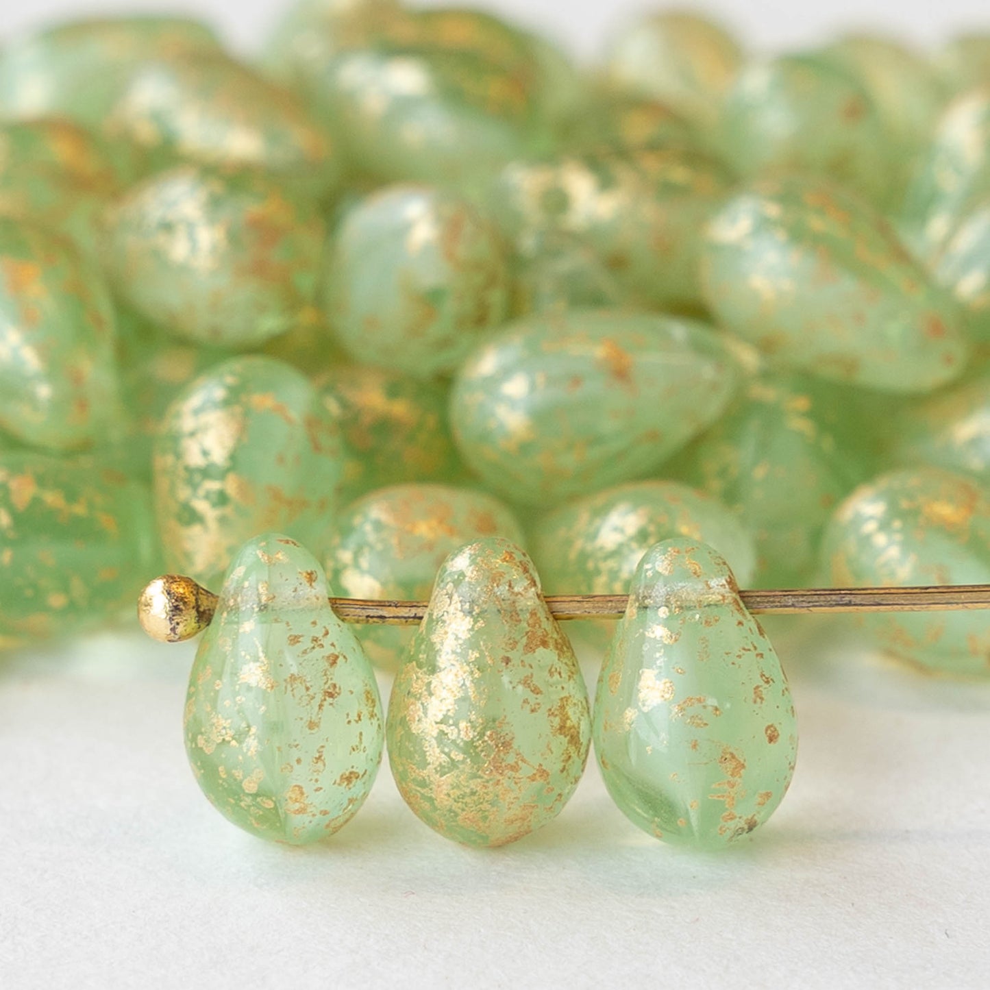 6x9mm Glass Teardrop Beads - Light Green with Gold Dust - 50 Beads