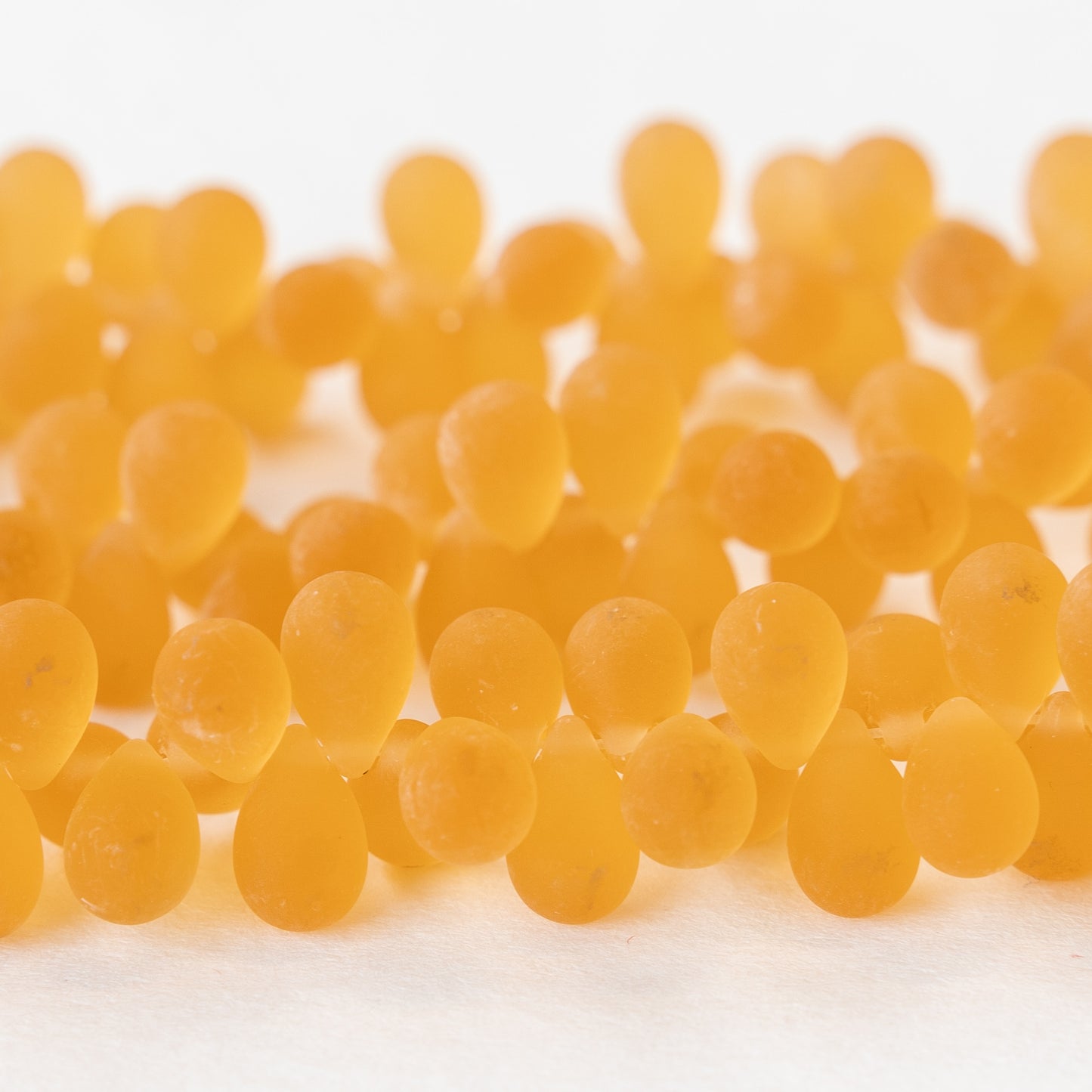 Load image into Gallery viewer, 6x9mm Glass Teardrop Beads - Amber Matte -  45 Beads

