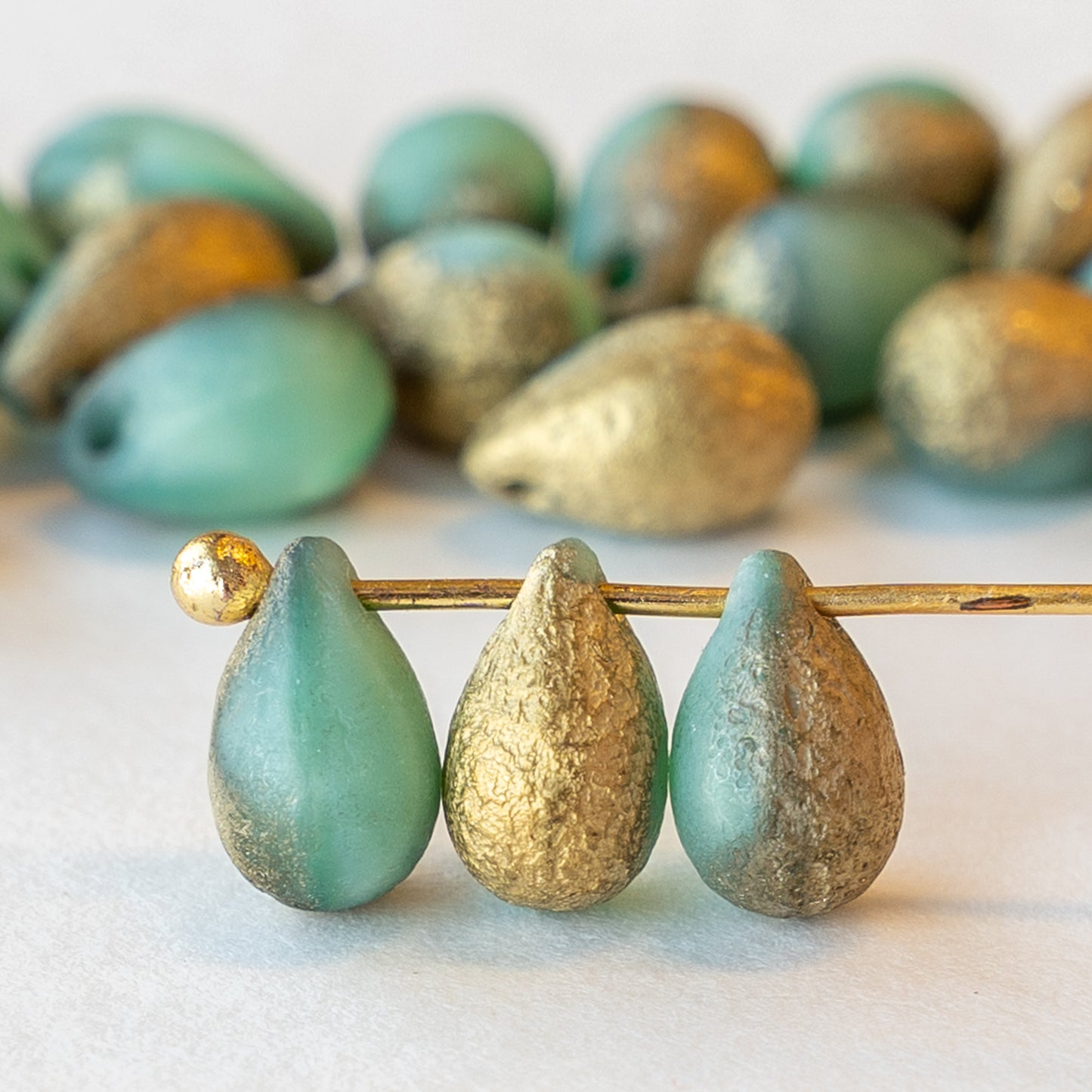 Load image into Gallery viewer, 6x9mm Glass Teardrop Beads -  Seafoam with Etched Gold Finish - 25 Beads
