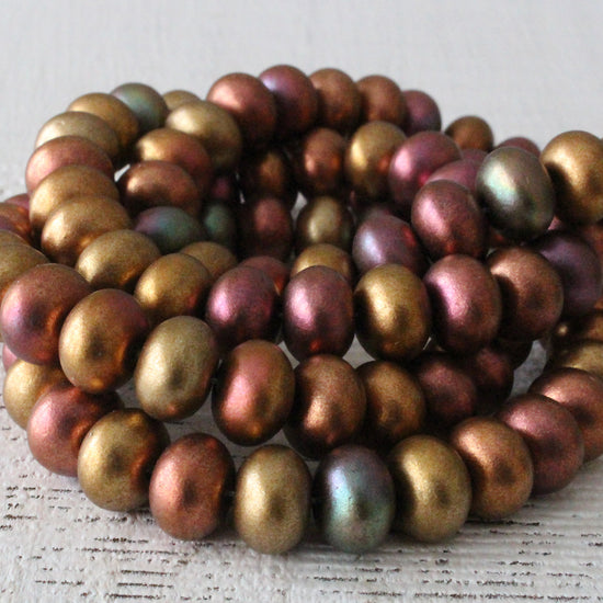 Load image into Gallery viewer, 6x9mm Smooth Rondelle - Gold Iris Matte - 25 Beads
