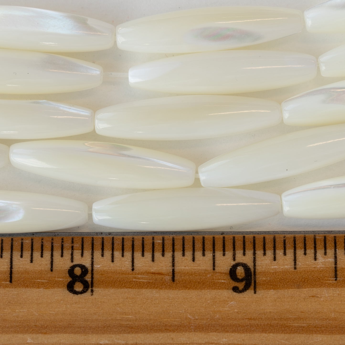 Mother Of Pearl - 7x30mm Tapered Tube - 16 Inch Strand