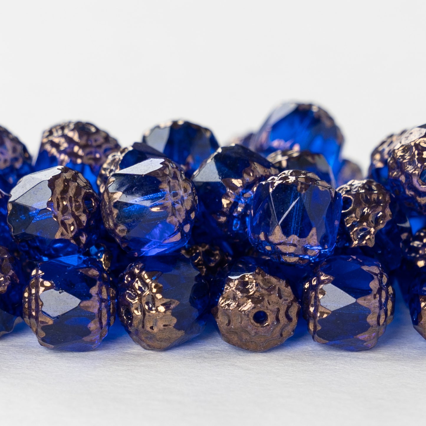 8mm Cathedral Tube - Capri Blue with Bronze - 20 Beads