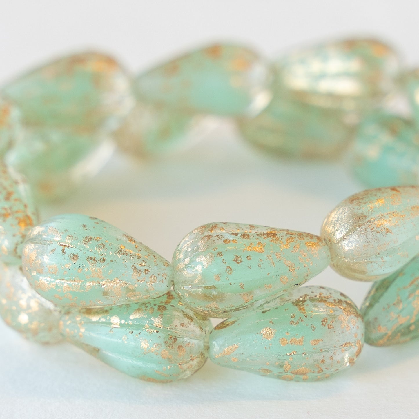 8x13mm Melon Drop - Silky Seafoam Green with Antique Gold Finish - 10 Beads