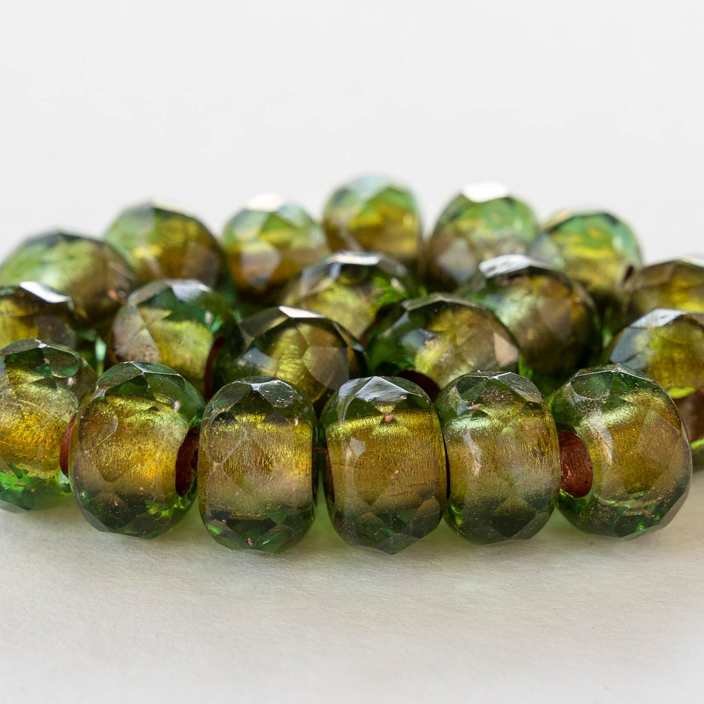 6x9mm Roller Beads - Copper Lined Peridot - Choose Amount – funkyprettybeads