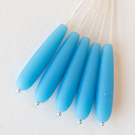 Load image into Gallery viewer, 8x38mm Long Drill Drops - Baby Blue - 10 Beads
