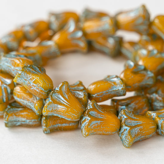 Load image into Gallery viewer, 9x10mm Lily / Tulip Flower Beads - Orange Opaline with Turquoise Wash - 15 Beads
