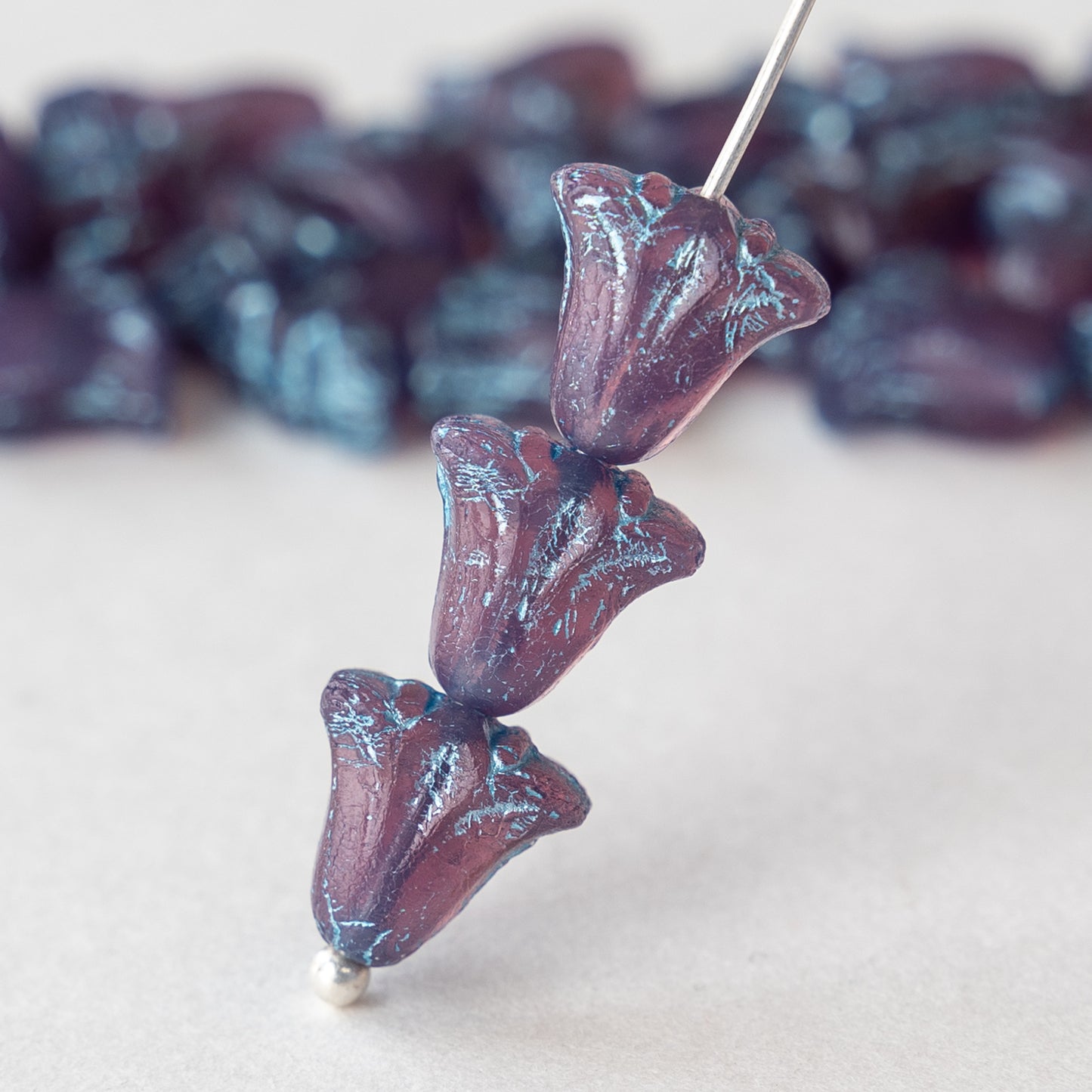 Load image into Gallery viewer, 9x10mm Lily / Tulip Flower Beads - Purple Opaline with Aqua Wash - 15 Beads

