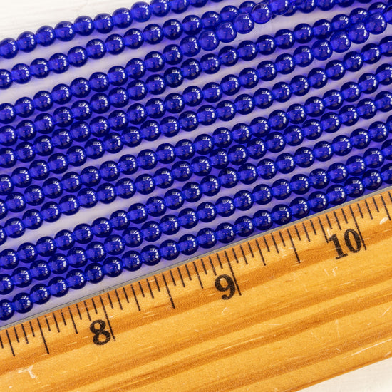 4mm Round Glass Beads - Transparent Cobalt - 100 Beads