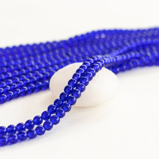 4mm Round Glass Beads - Transparent Cobalt - 100 Beads